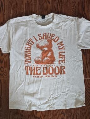 Teddy Swims Off White Graphic Tee with Orange Teddy Design